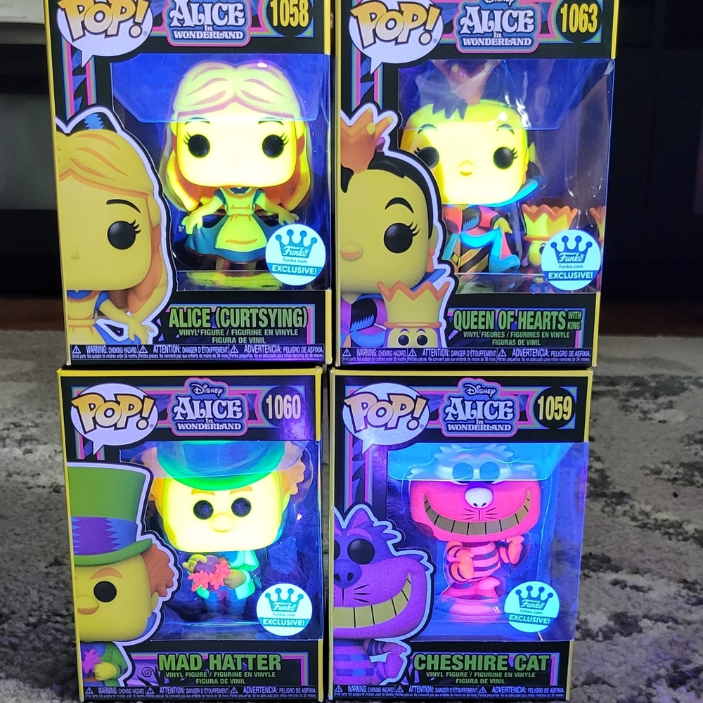 Funko Alice In Wonderland  blacklight set of 4
